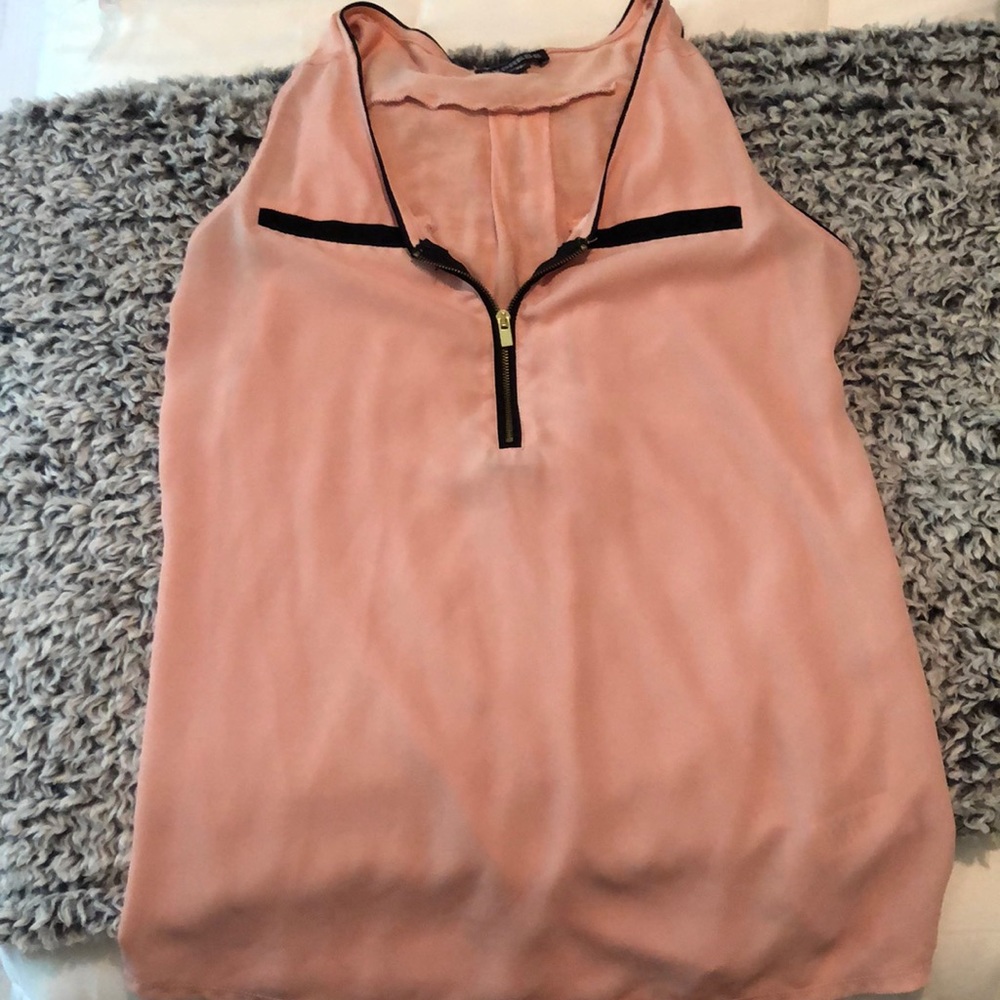 Pink sleeveless blouse